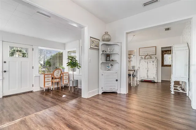 a view of livingroom with furniture and wooden floor