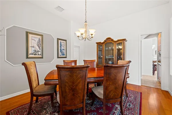a view of a dining room with furniture