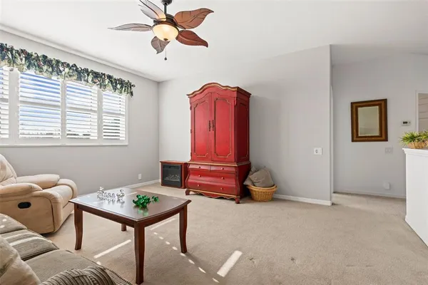a room with furniture and a window