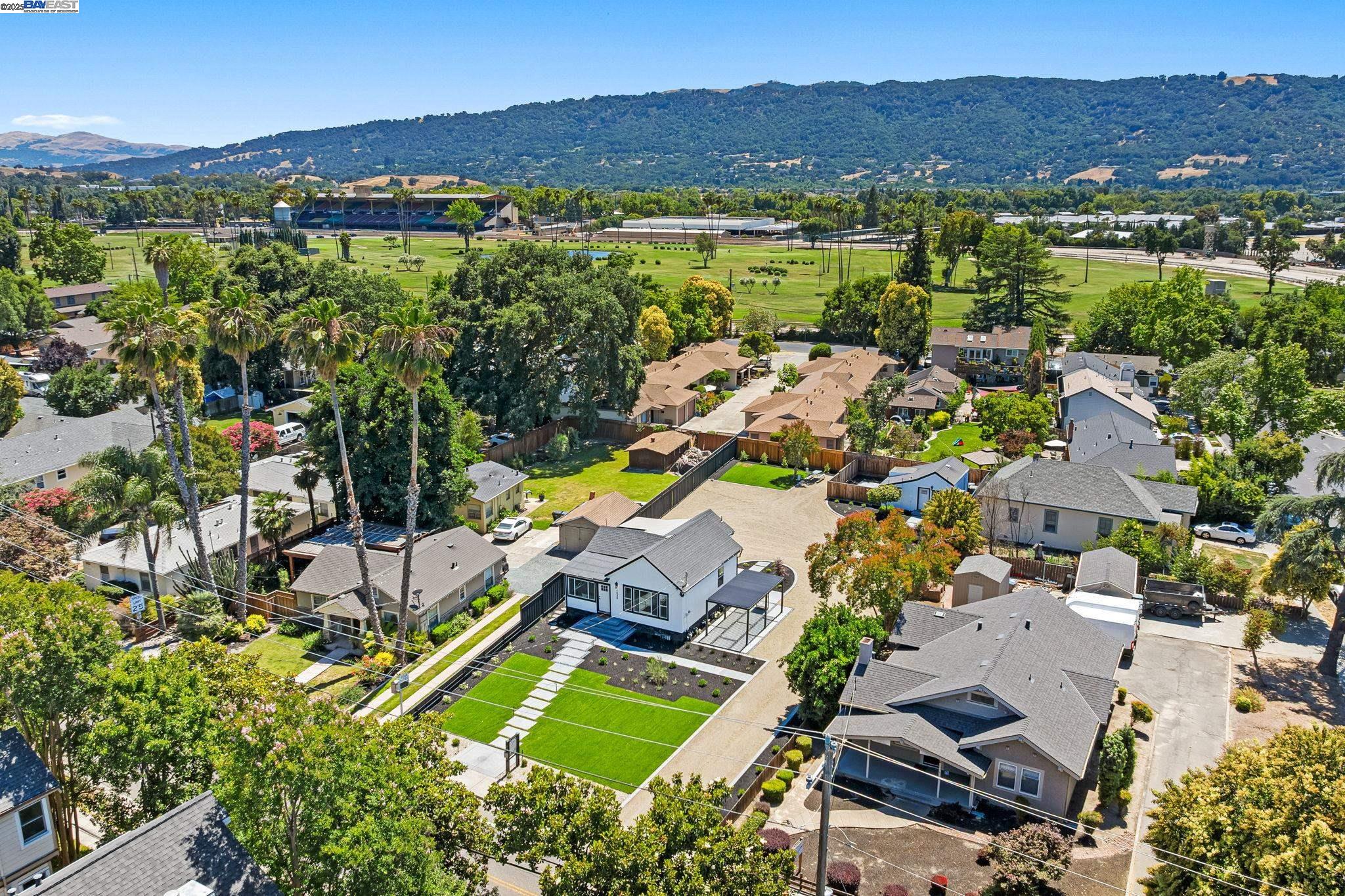 1038 Division Street Pleasanton, CA 94566 - Photo 2 of 53 an aerial view of a house with a garden