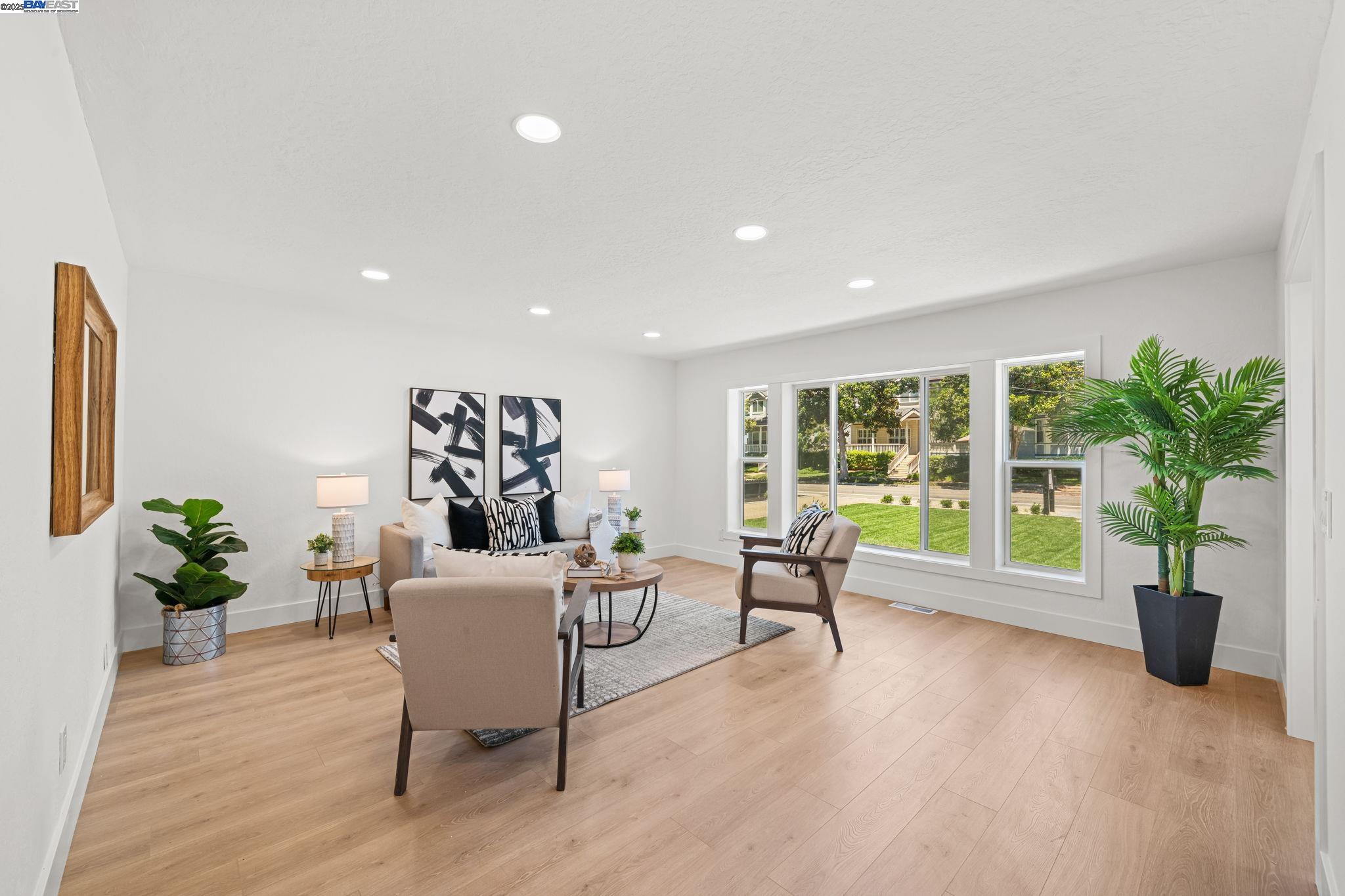 1038 Division Street Pleasanton, CA 94566 - Photo 21 of 53 a living room with furniture and potted plants