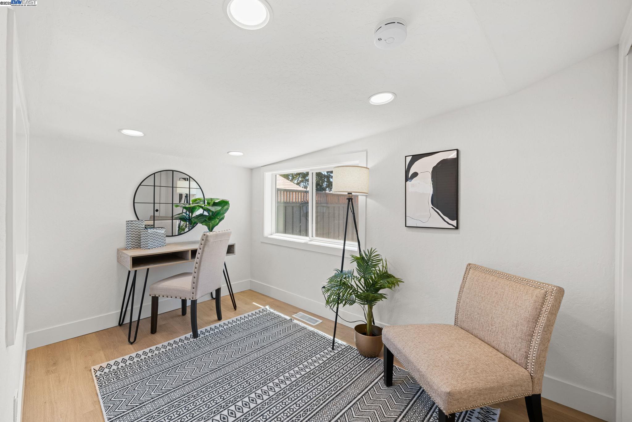 1038 Division Street Pleasanton, CA 94566 - Photo 34 of 53 a workspace with furniture window and wooden floor