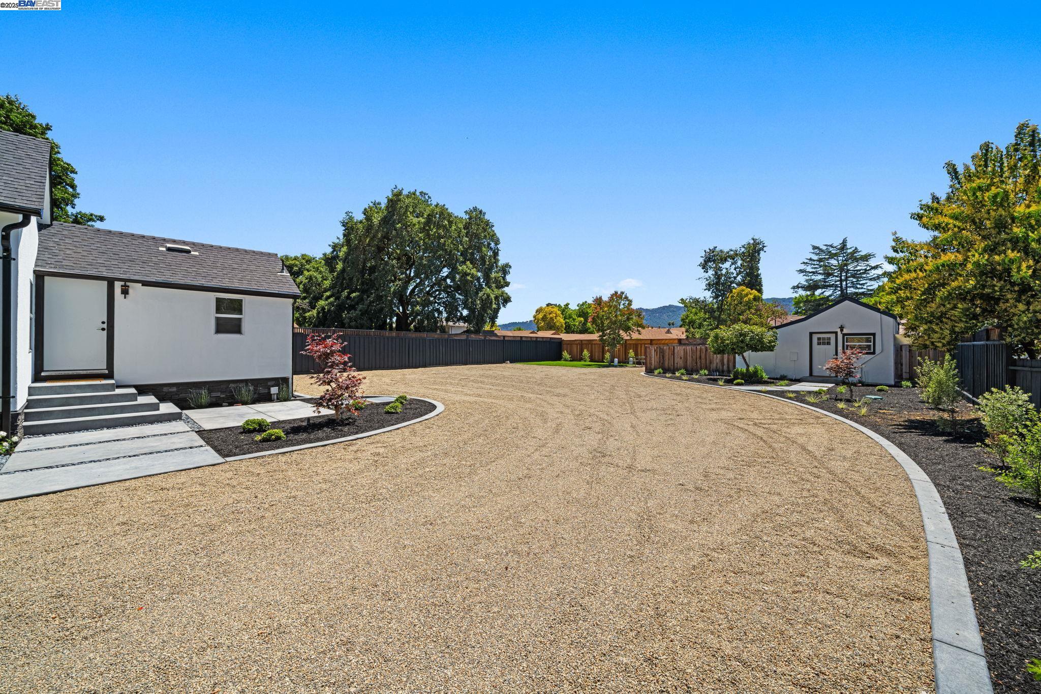 1038 Division Street Pleasanton, CA 94566 - Photo 4 of 53 a view of a patio with a yard