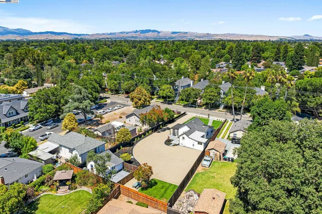 an aerial view of a house with garden space and outdoor space