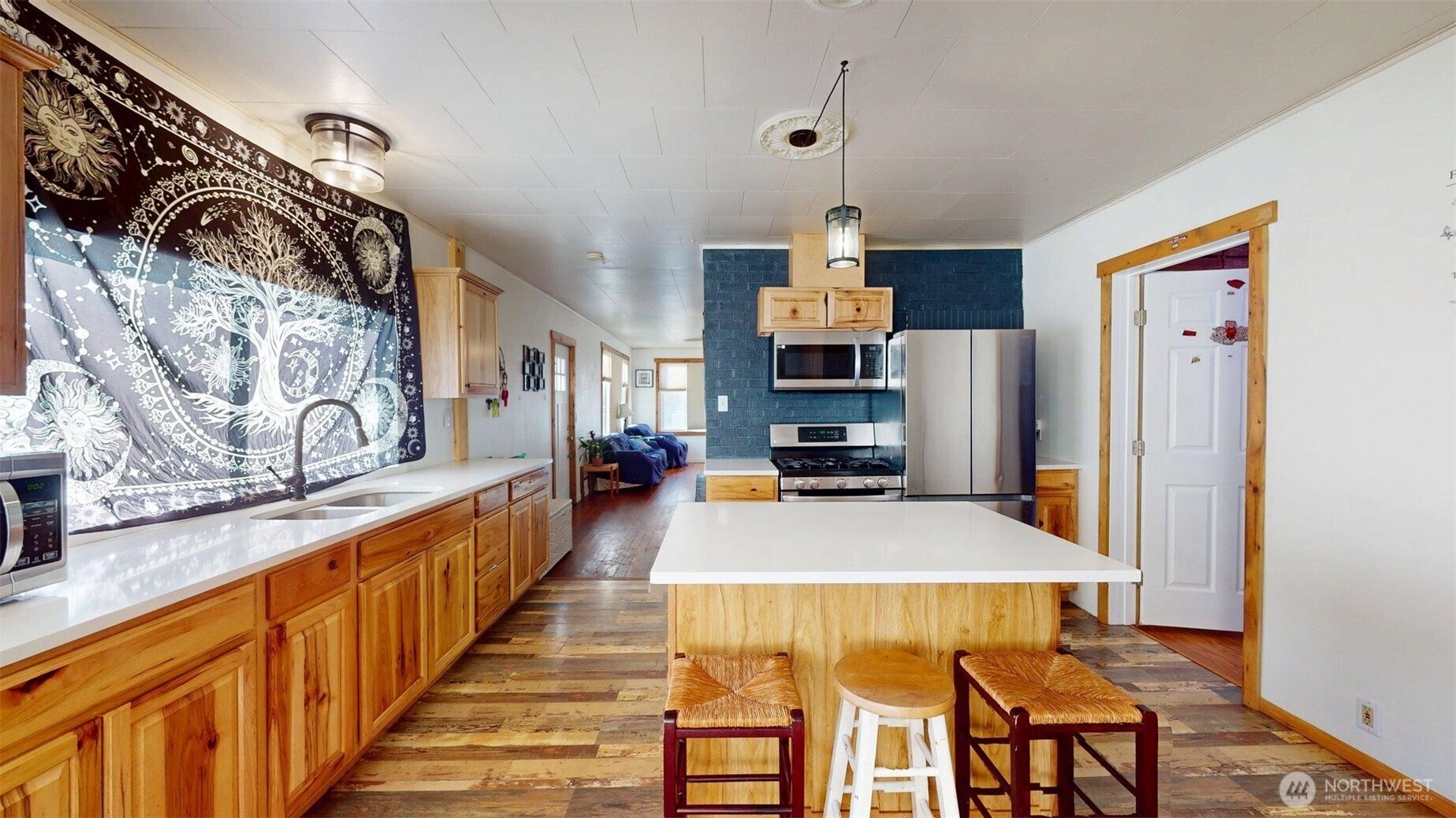 2124 Woburn Street Bellingham, WA 98229 - Photo 14 of 40 a view of a kitchen with furniture and natural light