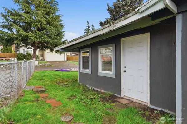 a backyard of a house with lots of green space