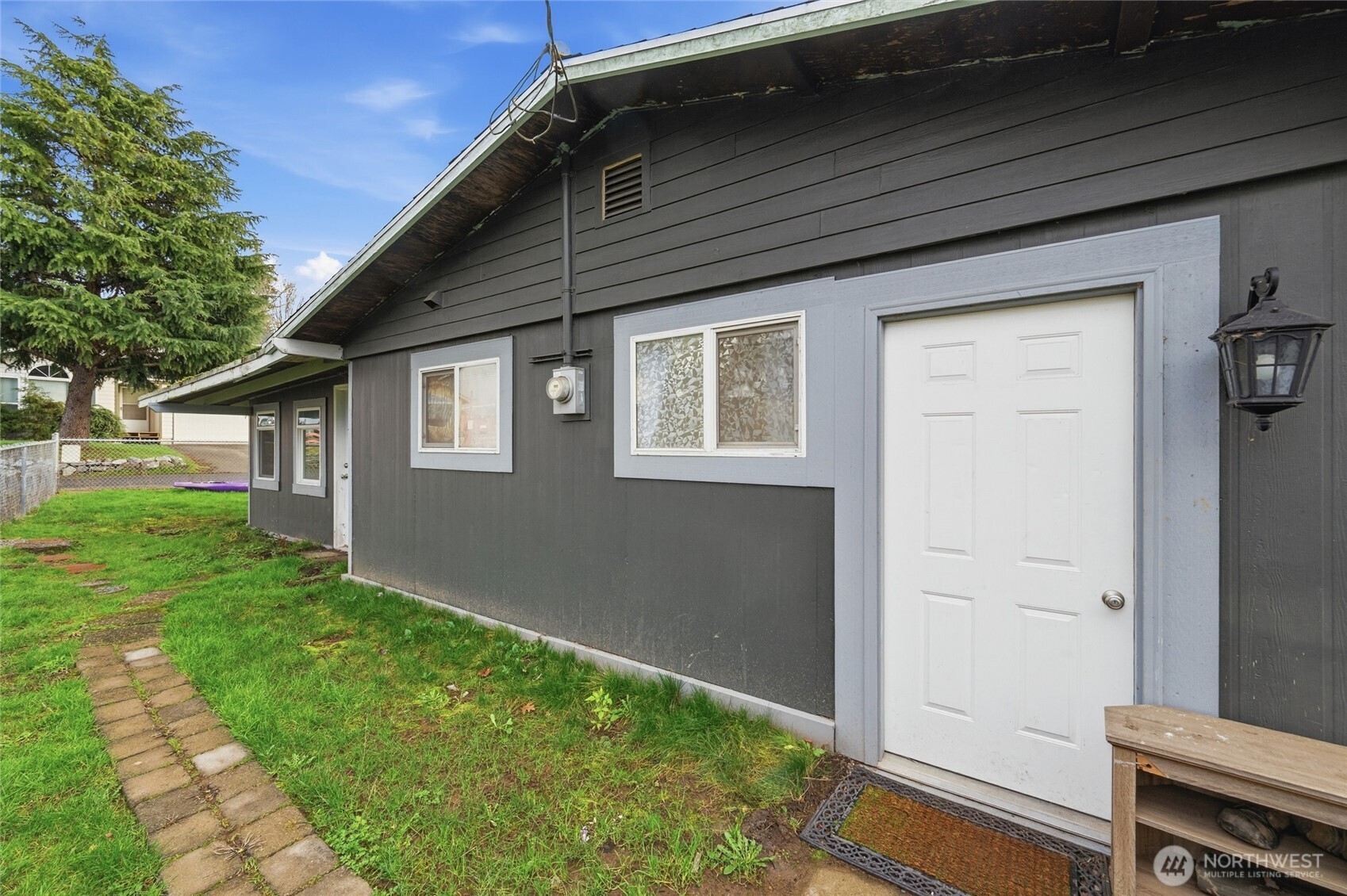 2124 Woburn Street Bellingham, WA 98229 - Photo 26 of 40 a backyard of a house with seating space