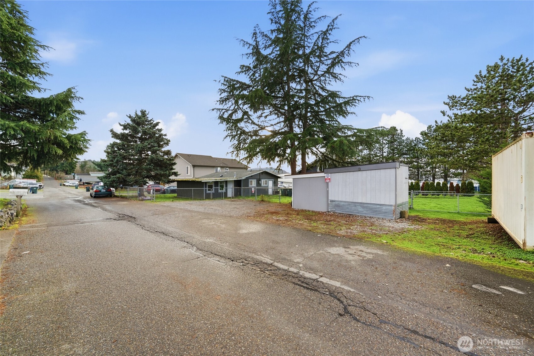 2124 Woburn Street Bellingham, WA 98229 - Photo 40 of 40 a front view of a house with a yard and a garage