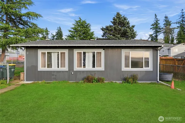 a house view with a garden space