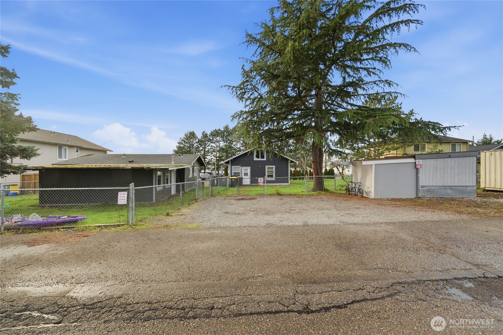 2124 Woburn Street Bellingham, WA 98229 - Photo 7 of 40 a view of road with house and trees in the background