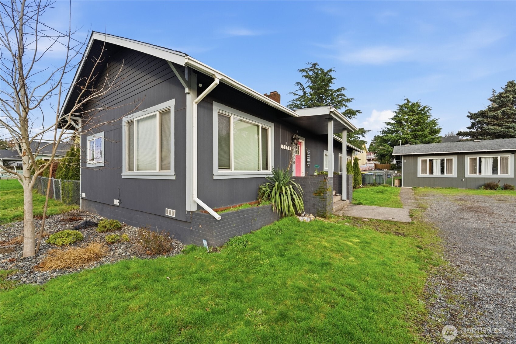 2124 Woburn Street Bellingham, WA 98229 - Photo 8 of 40 a front view of a house with a yard