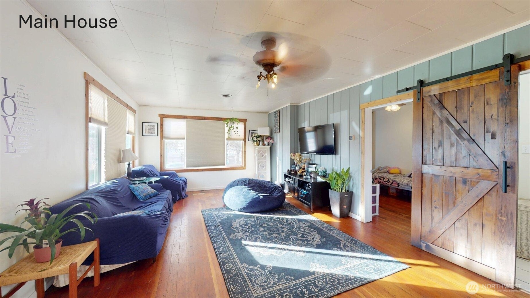 2124 Woburn Street Bellingham, WA 98229 - Photo 10 of 40 a living room with furniture potted plant and a window