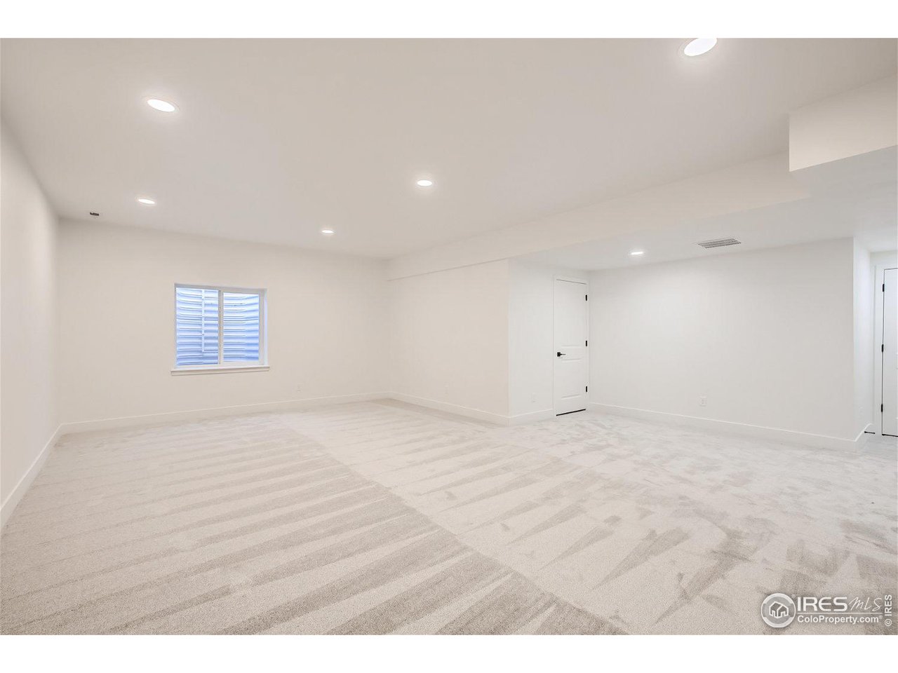 335 Boxwood Drive Windsor, CO 80550 - Photo 16 of 23 a view of an empty room