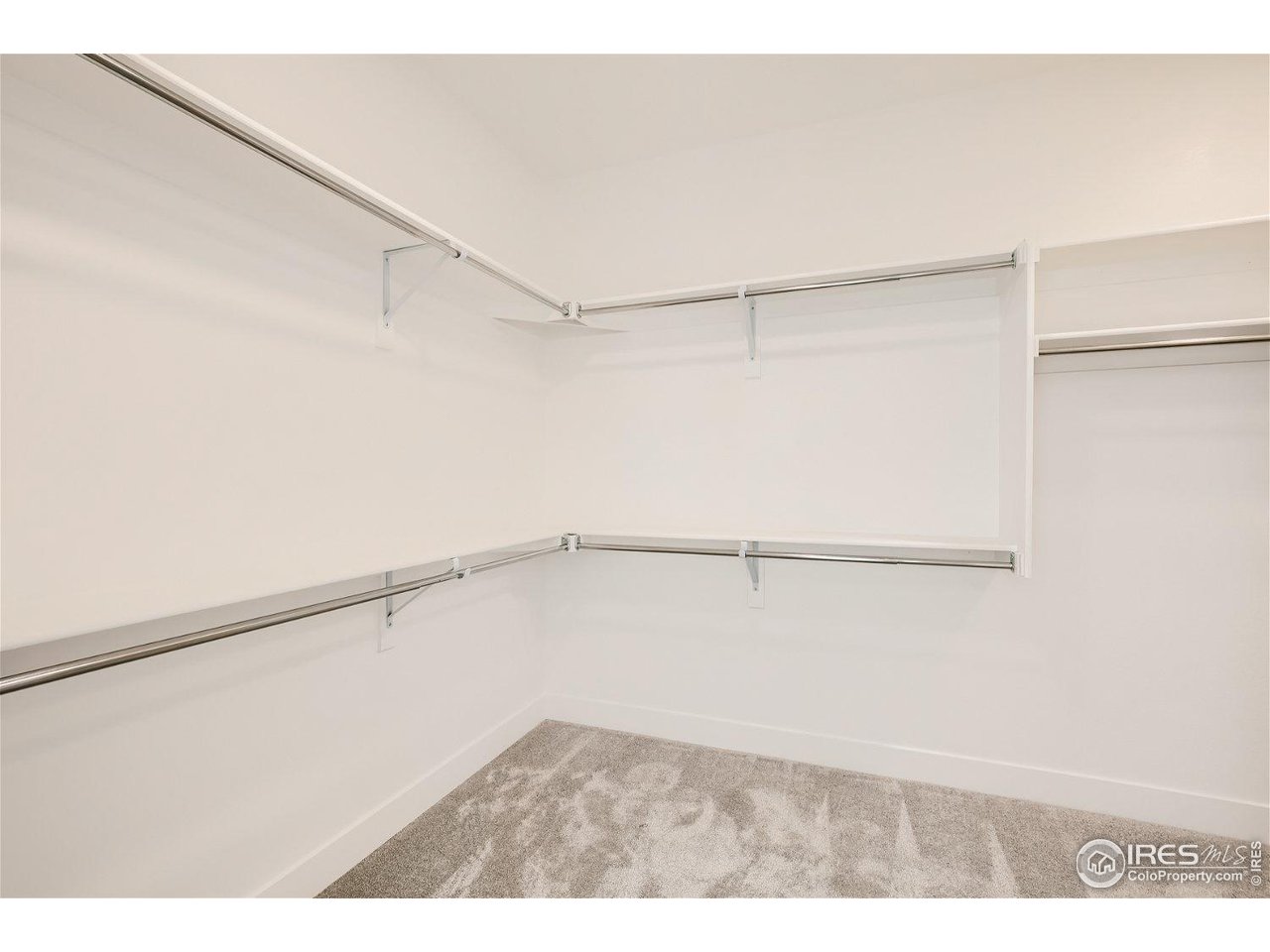 335 Boxwood Drive Windsor, CO 80550 - Photo 10 of 23 a view of an empty walk in closet