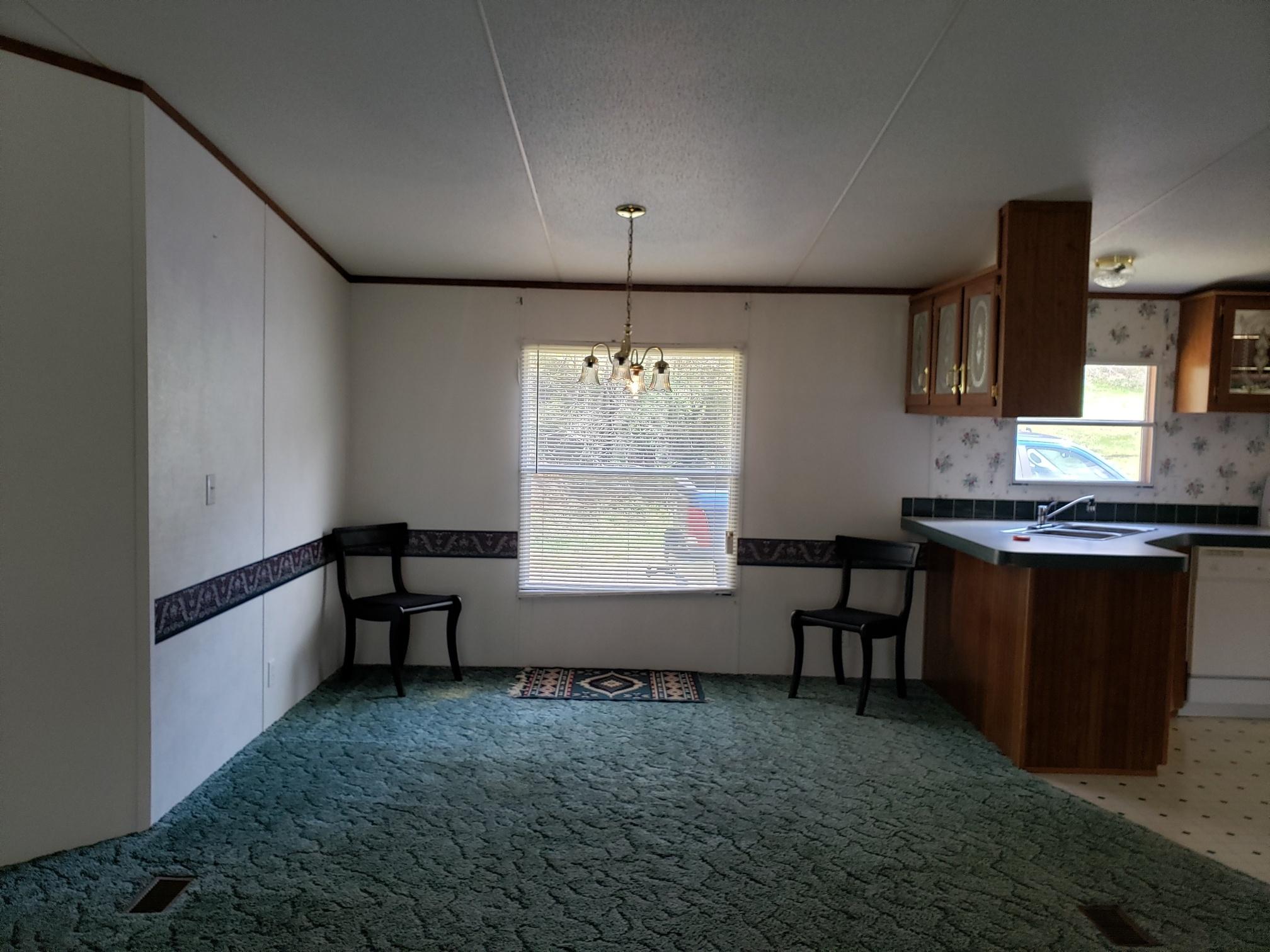 2900 Alleghany Spring Road Shawsville, VA 24162 - Photo 12 of 19 a living room with furniture window and wooden floor