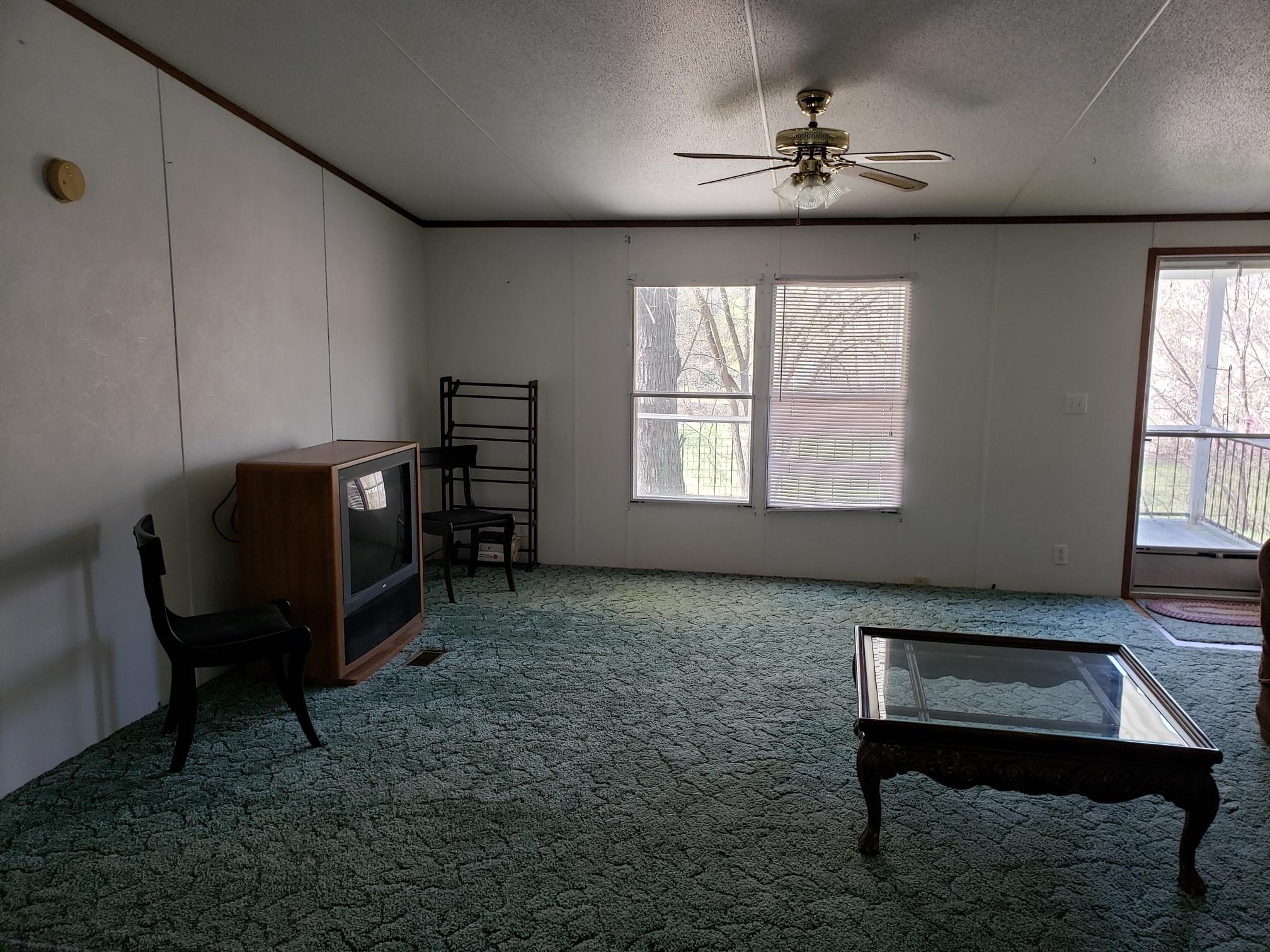 2900 Alleghany Spring Road Shawsville, VA 24162 - Photo 10 of 19 a living room with furniture a window and a piano
