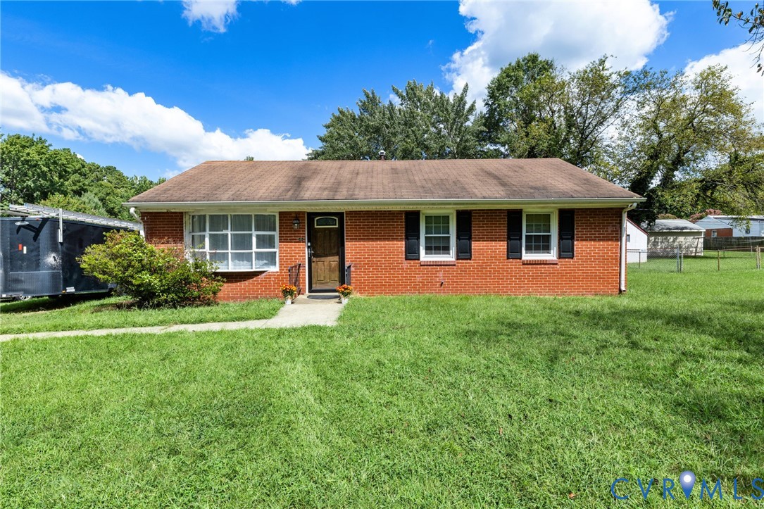 1700 Sizer Road Richmond, VA 23222 - Photo 16 of 16 Brick exterior featuring a wood entry door, multip