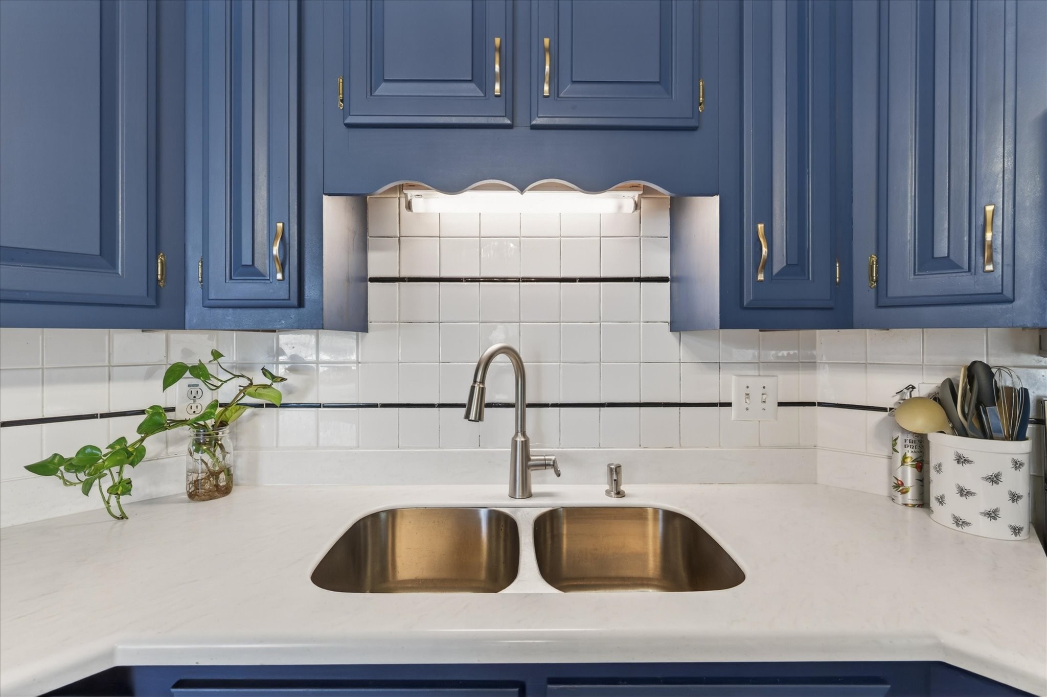 200 Cheshire Road Clarksville, TN 37043 - Photo 15 of 33 a kitchen with a sink and cabinets