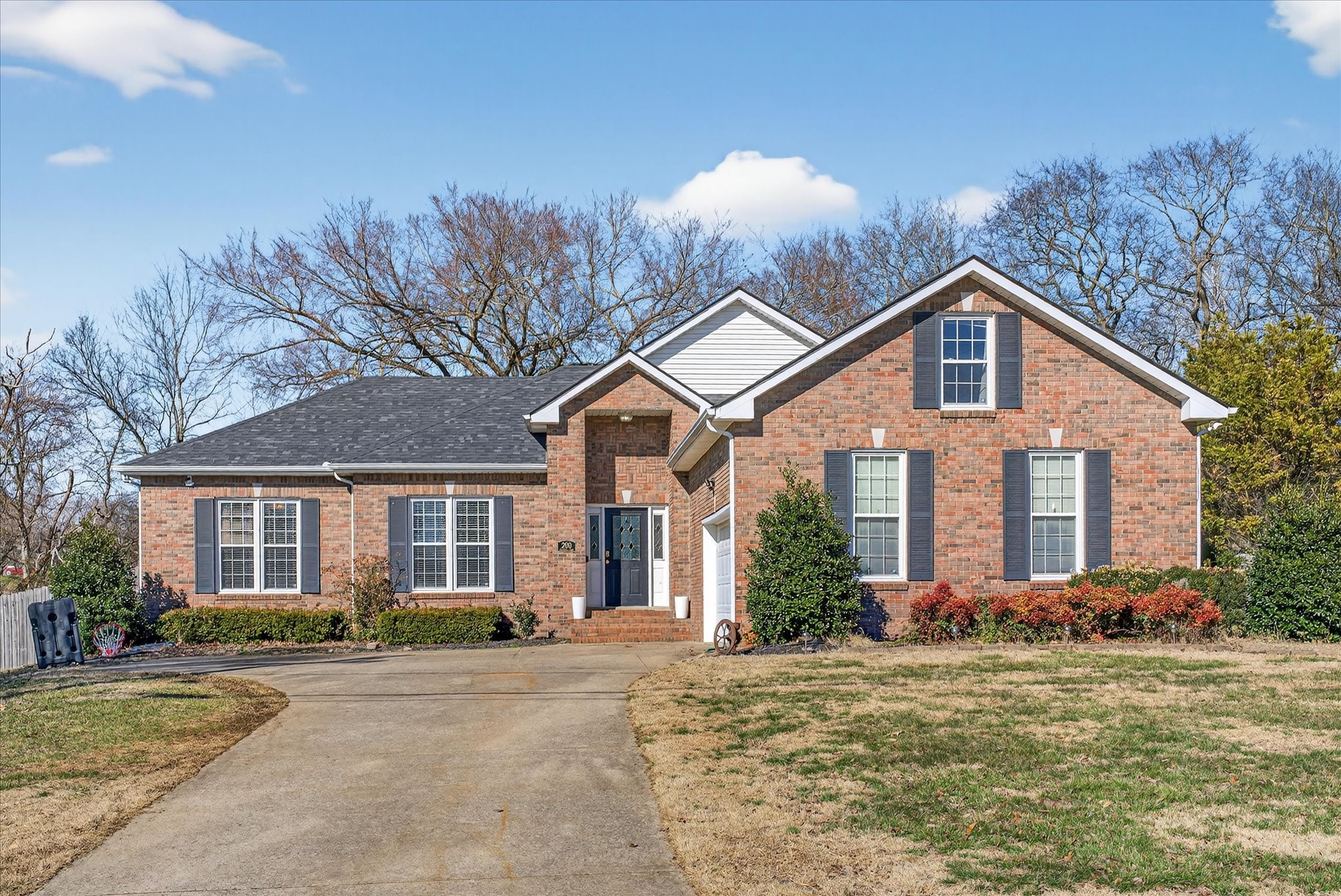 200 Cheshire Road Clarksville, TN 37043 - Photo 2 of 33 a front view of a house with a yard and garage