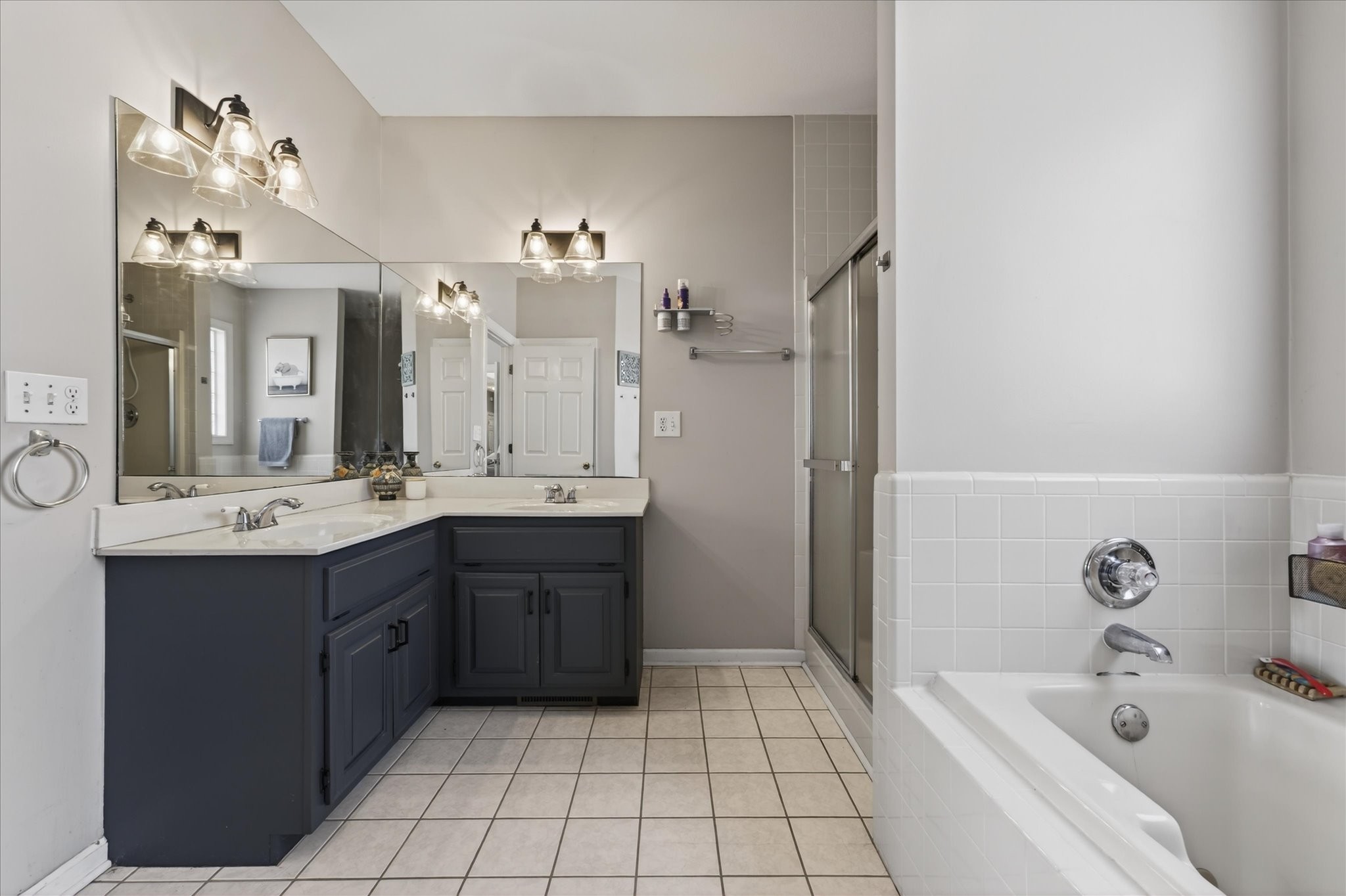 200 Cheshire Road Clarksville, TN 37043 - Photo 21 of 33 a spacious bathroom with a tub sink shower and mirror