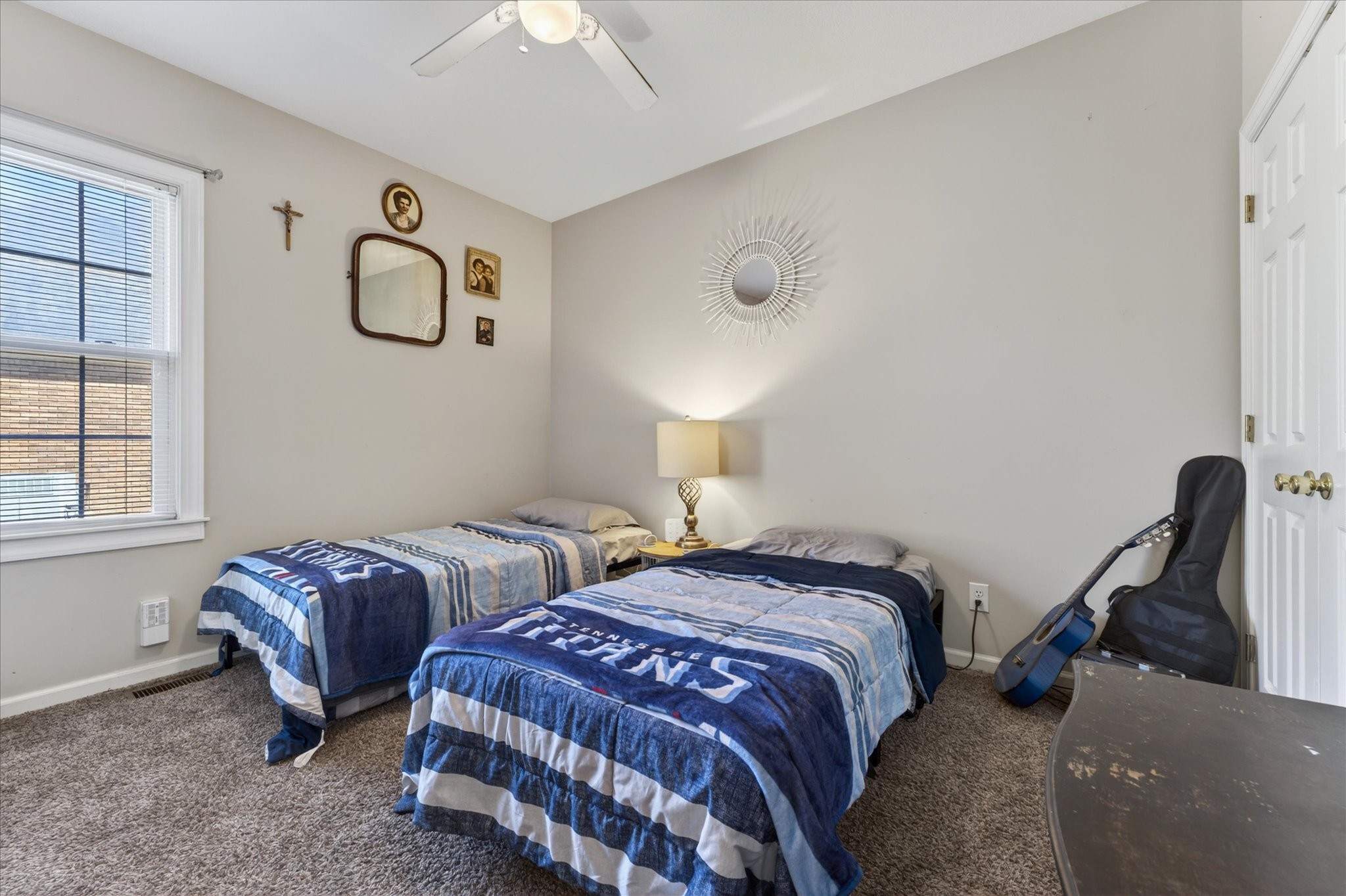 200 Cheshire Road Clarksville, TN 37043 - Photo 22 of 33 a bedroom with two beds and a chandelier