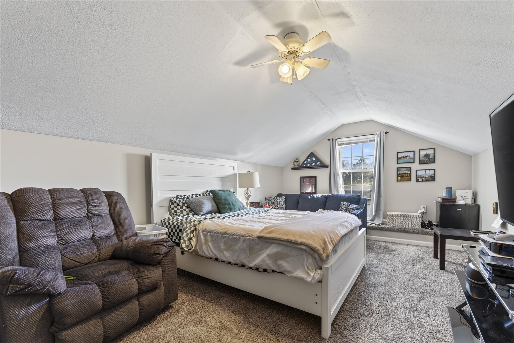 200 Cheshire Road Clarksville, TN 37043 - Photo 25 of 33 a bedroom with a bed couch and windows