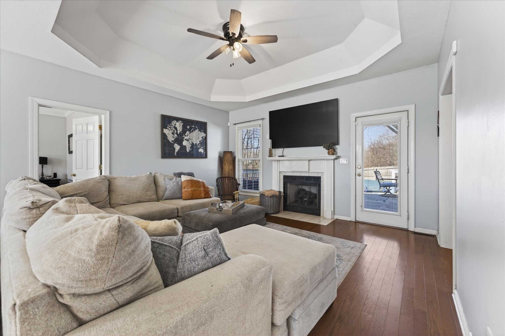200 Cheshire Road Clarksville, TN 37043 - Photo 7 of 33 a living room with furniture a flat screen tv and a fireplace