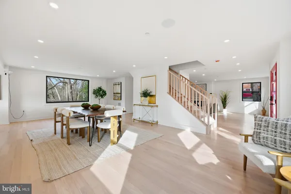 a view of a living room and dining room