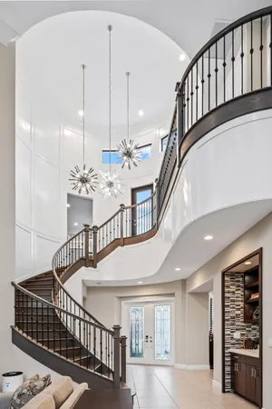 a view of a hallway with a chandelier