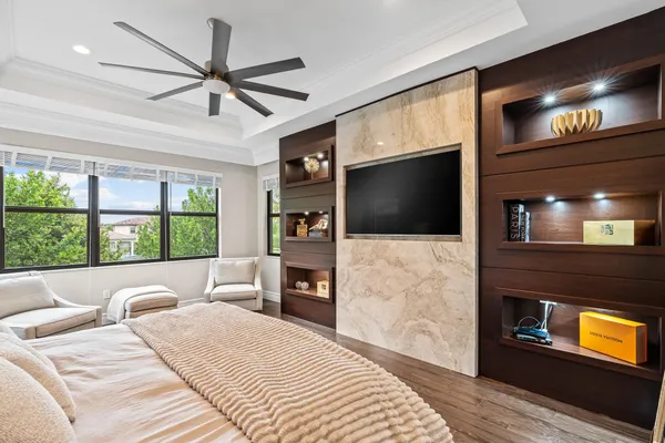 a spacious bathroom with a granite countertop tub sink shower and mirror