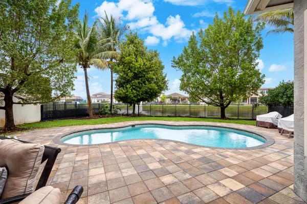 a view of outdoor space yard swimming pool and porch