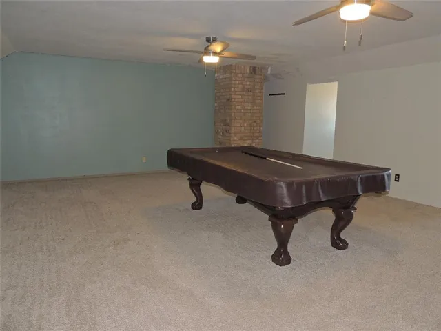 a room with pool table