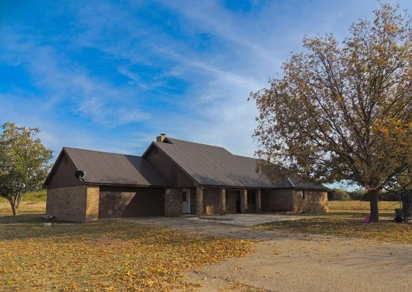 a view of a yard with an ocean view