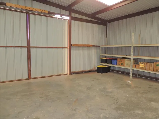 a view of storage and utility room with racks