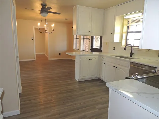 a bathroom with a sink a vanity and a mirror