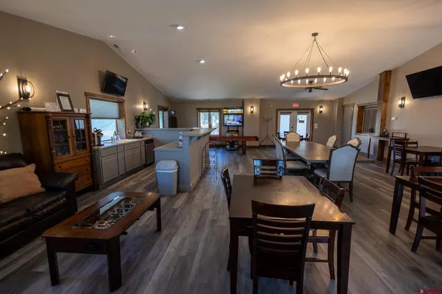 a view of a dining room with furniture