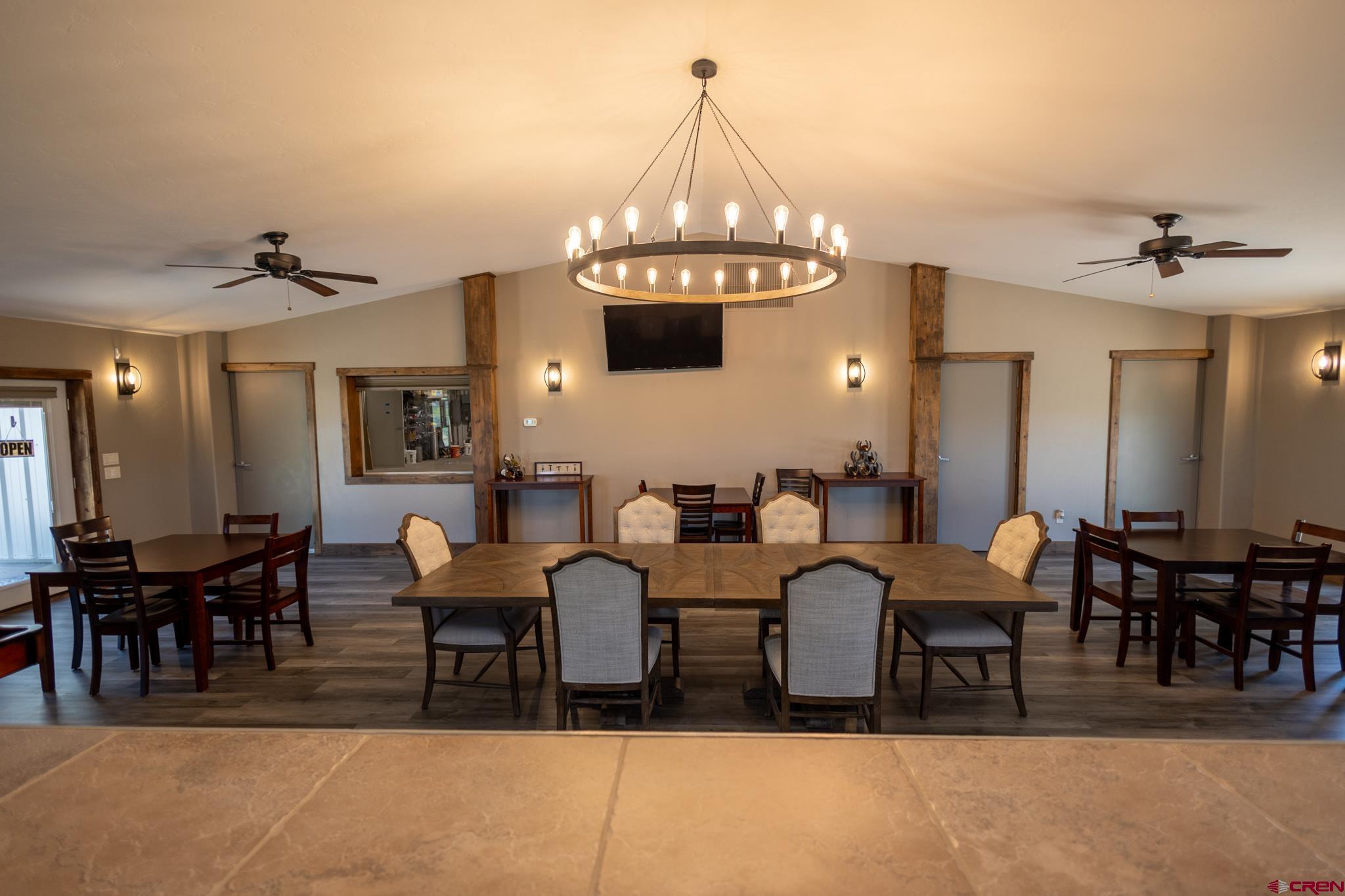 53582 Falcon Road Olathe, CO 81425 - Photo 32 of 42 a view of a dining room with furniture
