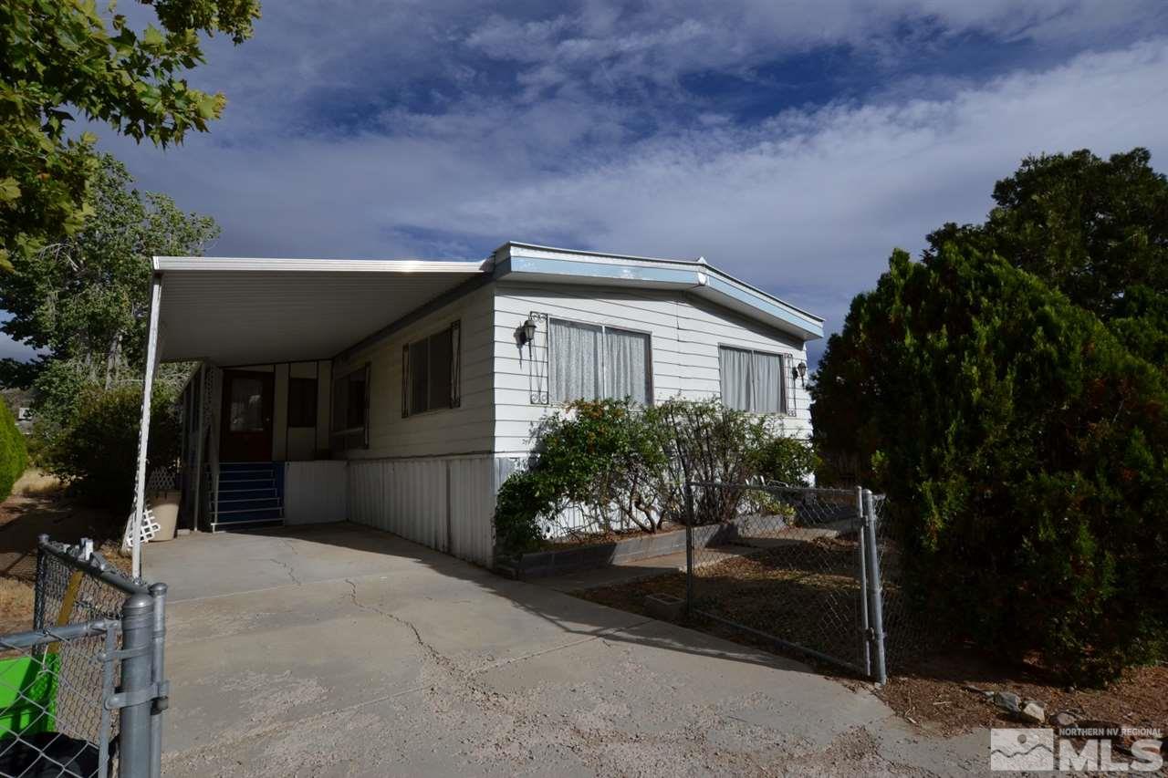 16055 Rhyolite Circle Reno, NV 89521 - Photo 1 of 23 a view of a house with a yard
