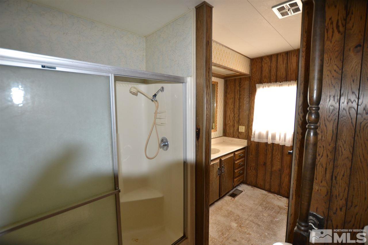 16055 Rhyolite Circle Reno, NV 89521 - Photo 15 of 23 a bathroom with a shower and a sink