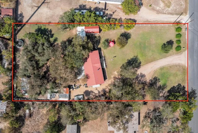 a house view with a garden space