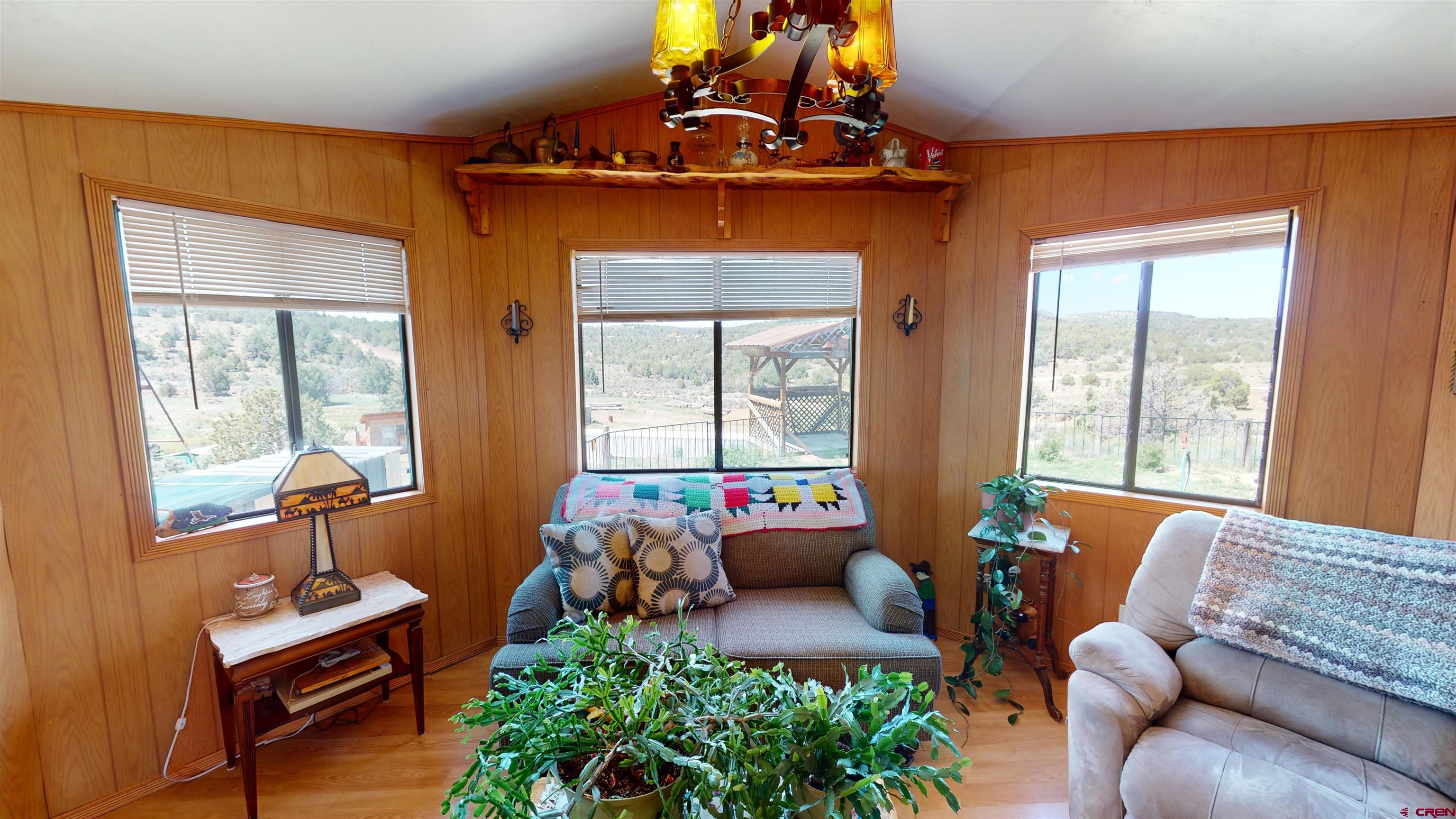 337 County Road 4018 Navajo Dam, CO 87419 - Photo 7 of 20 a living room with furniture and a window