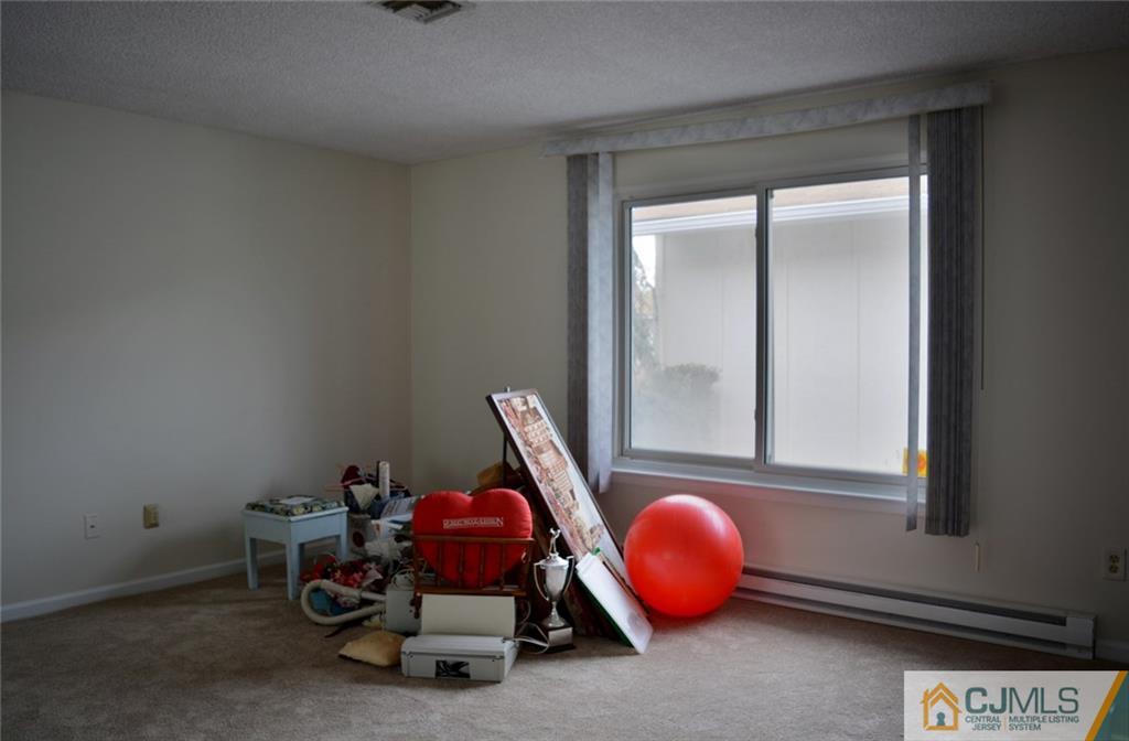 40 A Haddon Road Monroe Township, NJ 08831 - Photo 8 of 11 a view of a room with a window