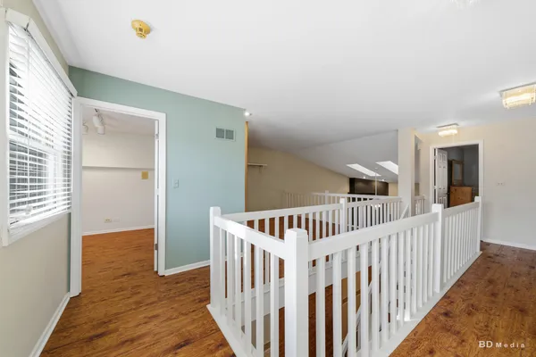a view of hallway with stairs
