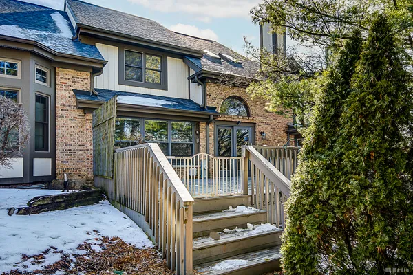 a front view of a house with staircase