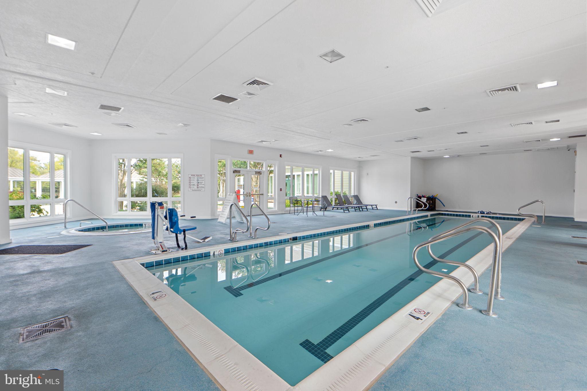 699 Winding Stream Way, Unit 203 Odenton, MD 21113 - Photo 30 of 41 a view of a living room and dining room