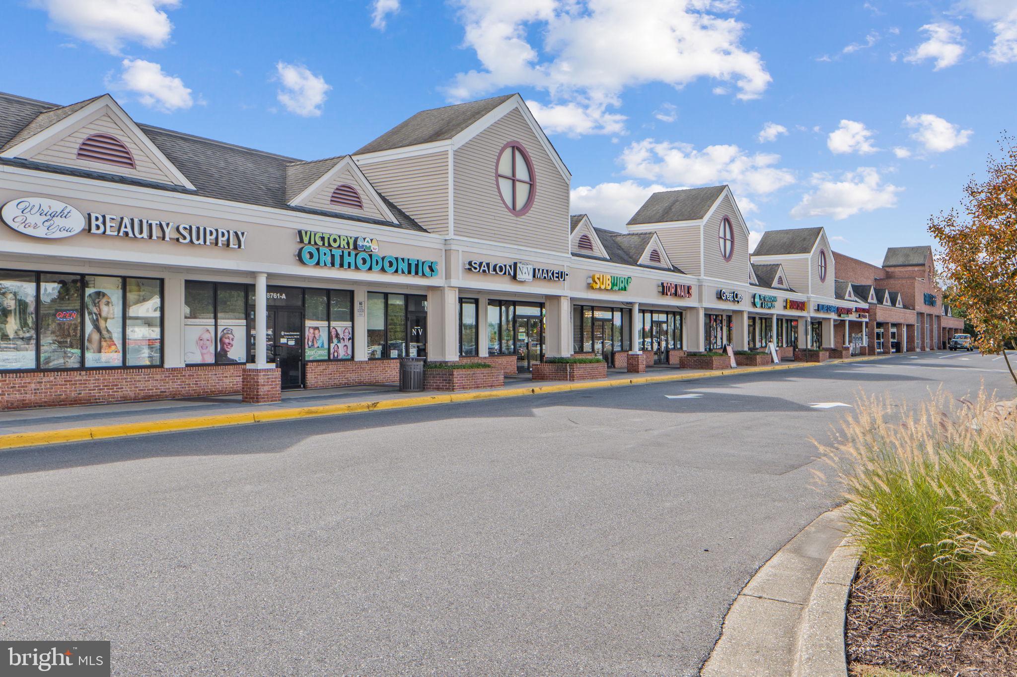 699 Winding Stream Way, Unit 203 Odenton, MD 21113 - Photo 35 of 41 a view of a building with a swimming pool