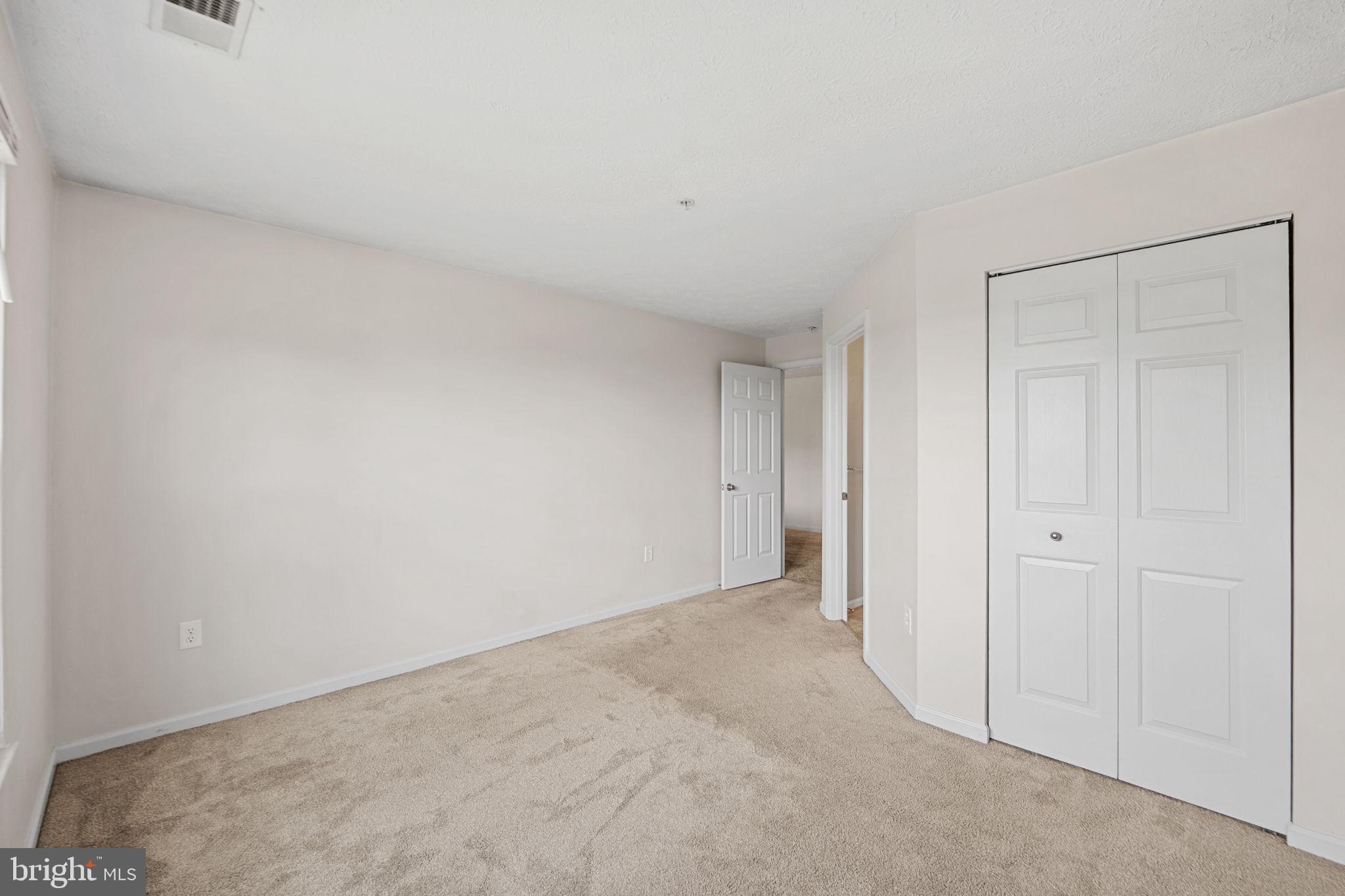 699 Winding Stream Way, Unit 203 Odenton, MD 21113 - Photo 10 of 41 a view of an empty room