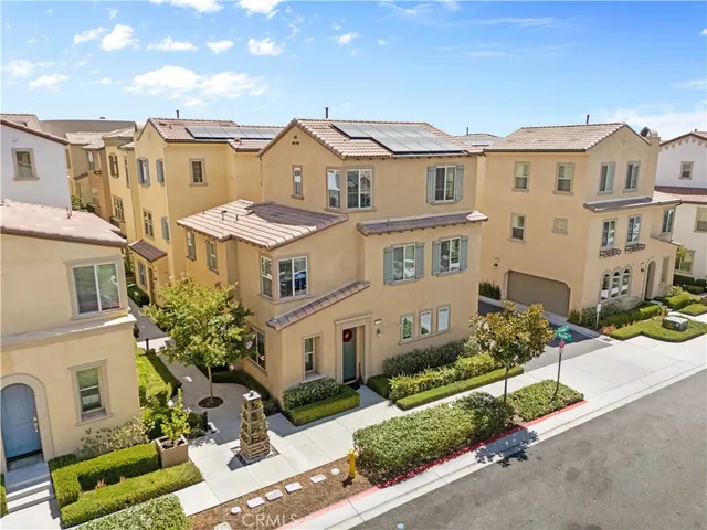 an aerial view of a multi story residential apartment building