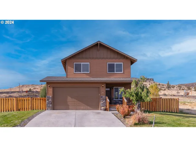 a black and white photo of a house