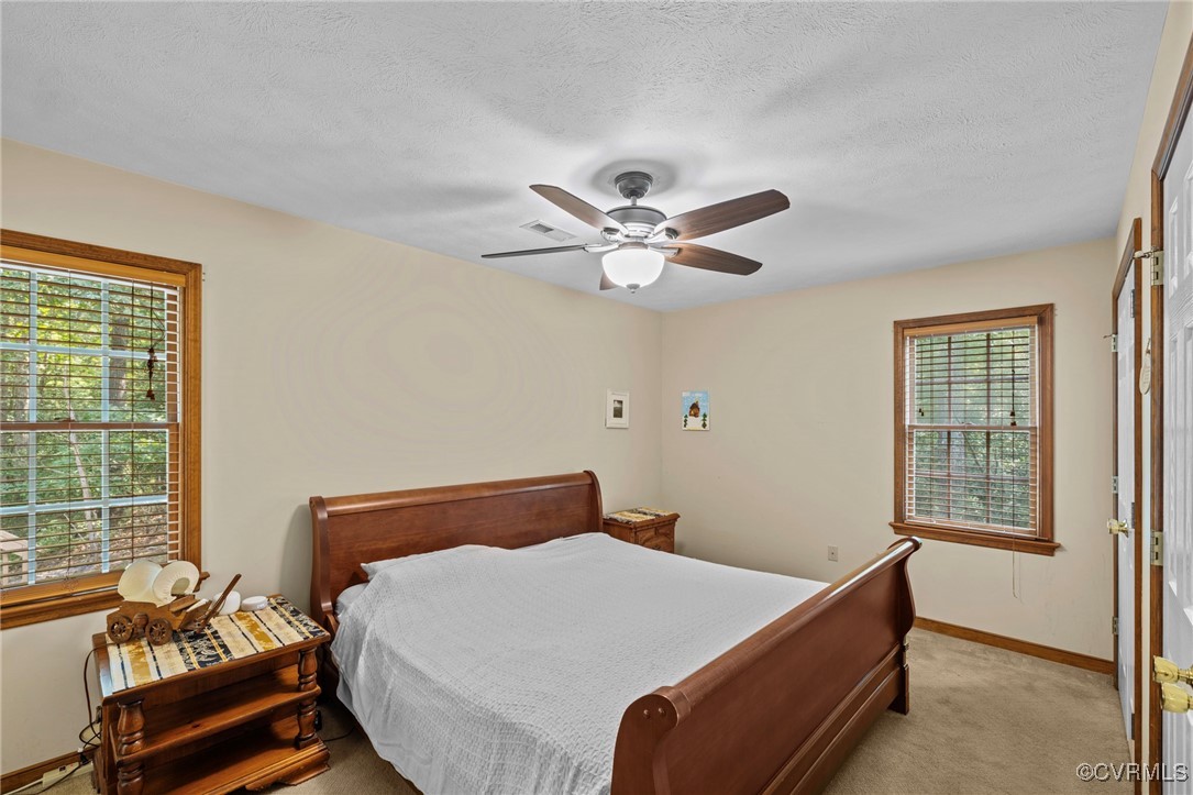 6137 Dijon Drive Mechanicsville, VA 23111 - Photo 15 of 44 a bed room with a bed and a window